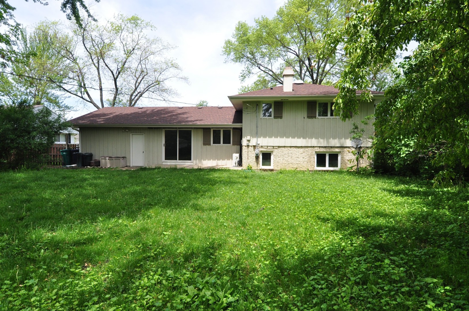 49 Miller Road Lake Zurich, IL 60047 - Photo 19 of 19 a front view of a house with a garden