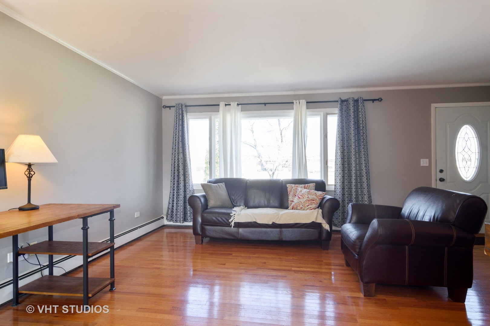 49 Miller Road Lake Zurich, IL 60047 - Photo 4 of 19 a living room with furniture and a window
