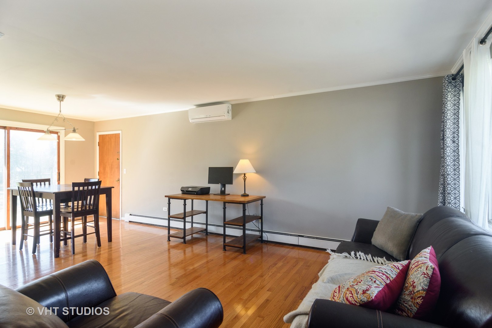 49 Miller Road Lake Zurich, IL 60047 - Photo 5 of 19 a living room with furniture wooden floor and dining table