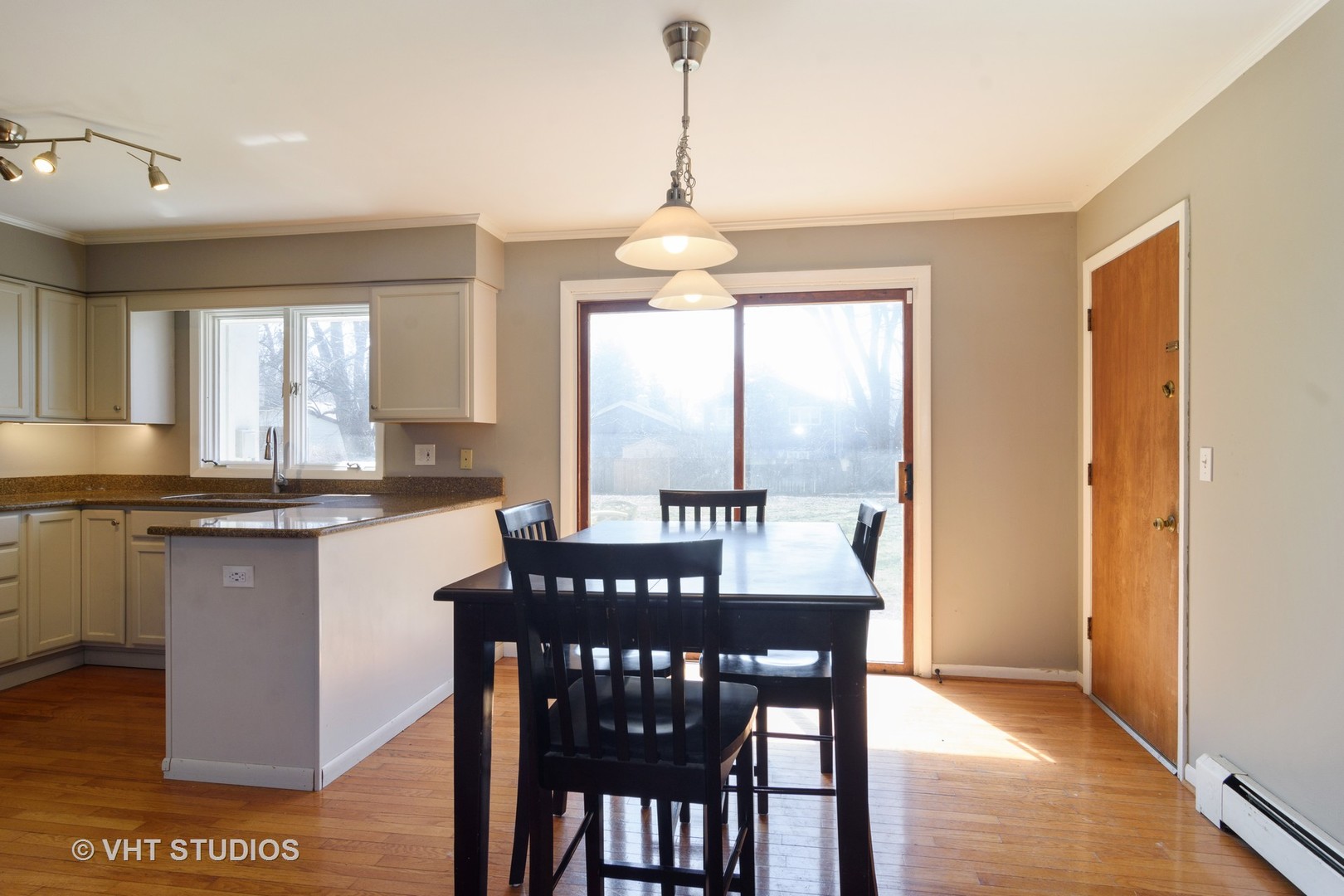 49 Miller Road Lake Zurich, IL 60047 - Photo 8 of 19 a dining room with furniture window and wooden floor