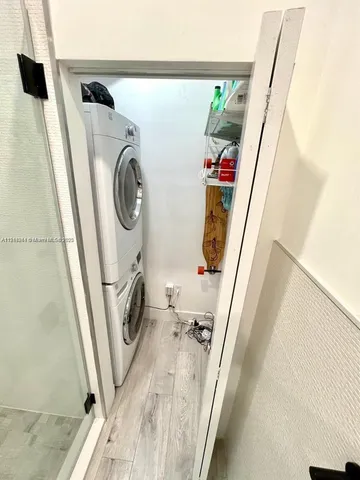 a view of a house with backyard porch and furniture