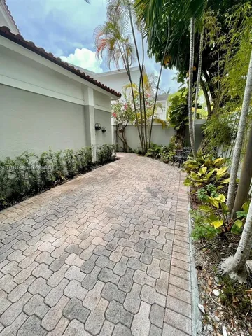 a view of a park with furniture