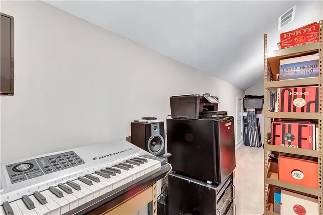 a view of work space with lounge chair
