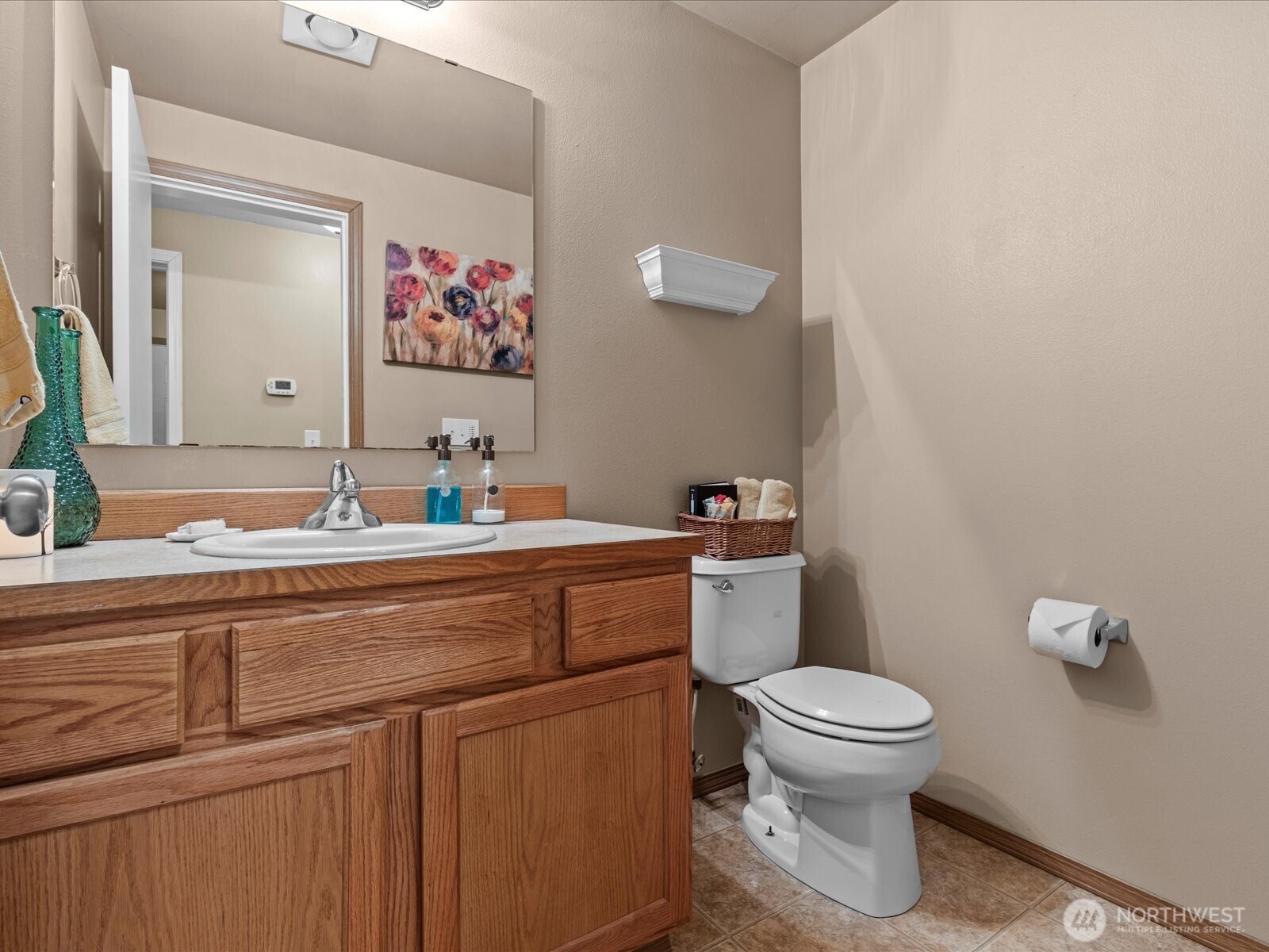 218-38 Bowen Road Mossyrock, WA 98564 - Photo 13 of 40 a bathroom with a toilet sink and mirror