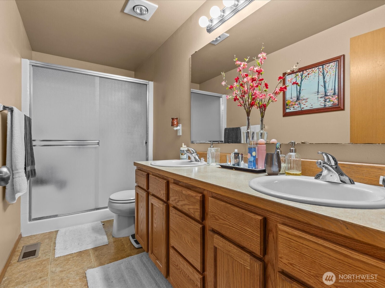 218-38 Bowen Road Mossyrock, WA 98564 - Photo 19 of 40 a bathroom with a granite countertop sink mirror vanity and toilet