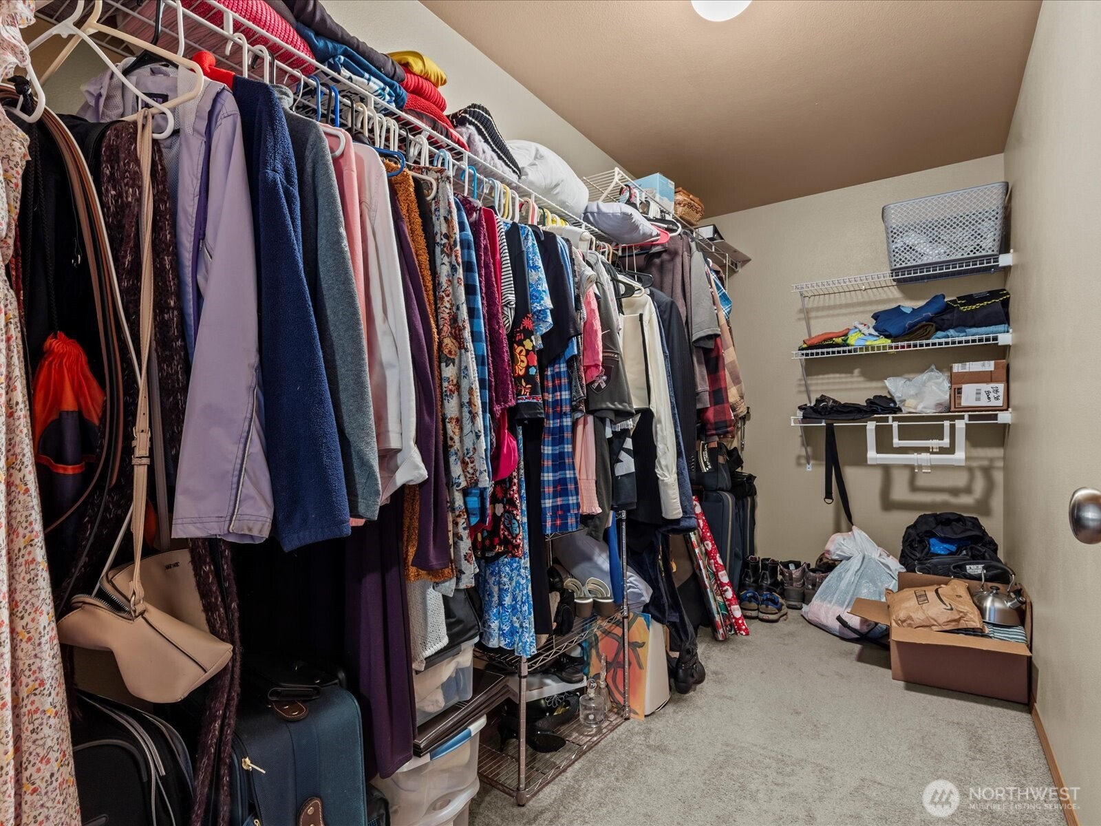 218-38 Bowen Road Mossyrock, WA 98564 - Photo 20 of 40 a view of walk in closet with clothes and shoes