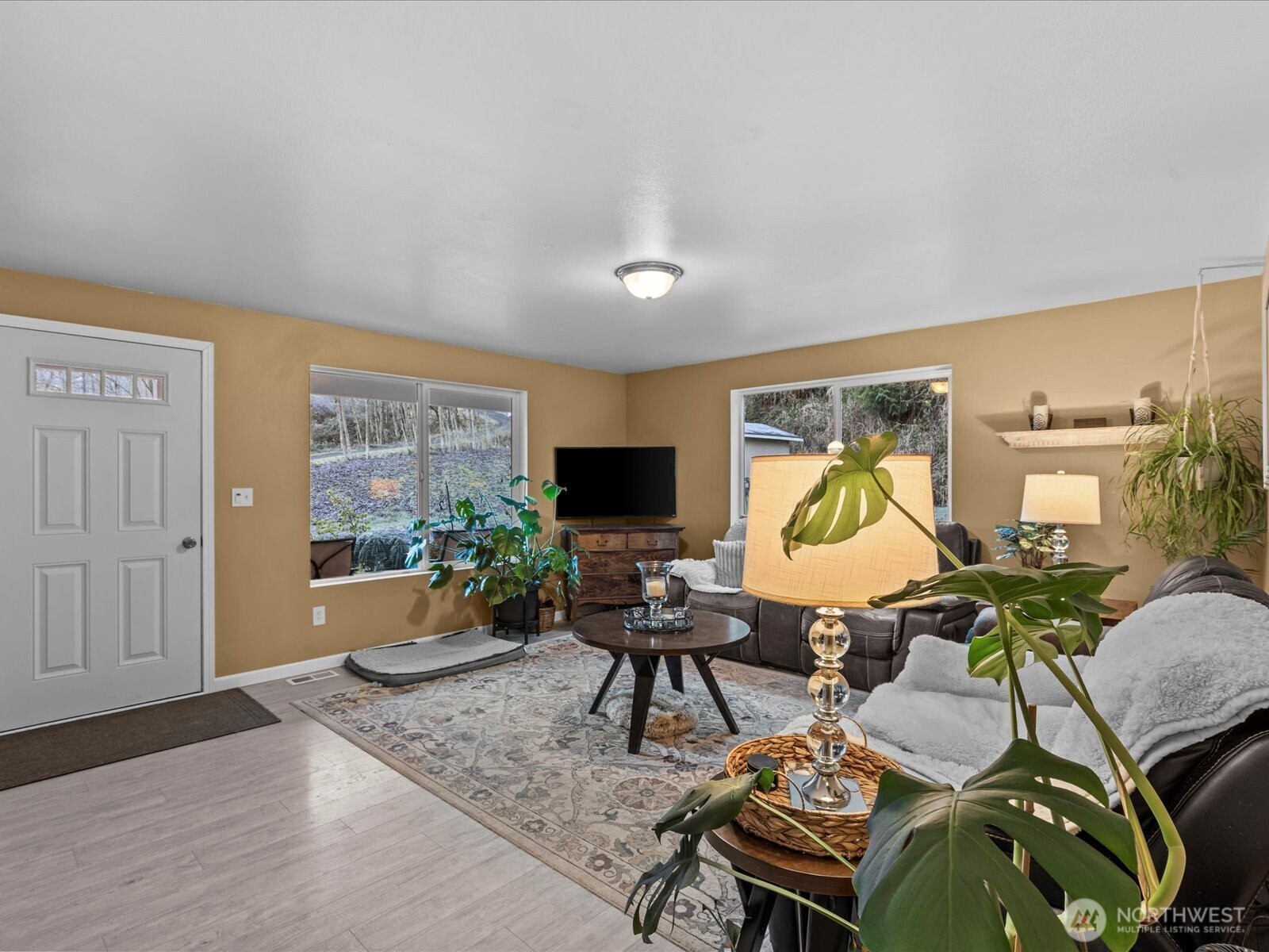 218-38 Bowen Road Mossyrock, WA 98564 - Photo 4 of 40 a living room with furniture and a flat screen tv