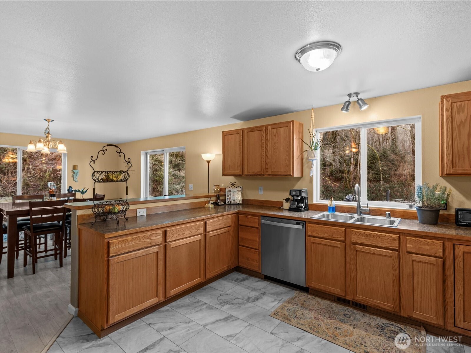 218-38 Bowen Road Mossyrock, WA 98564 - Photo 7 of 40 a large kitchen with a sink and cabinets