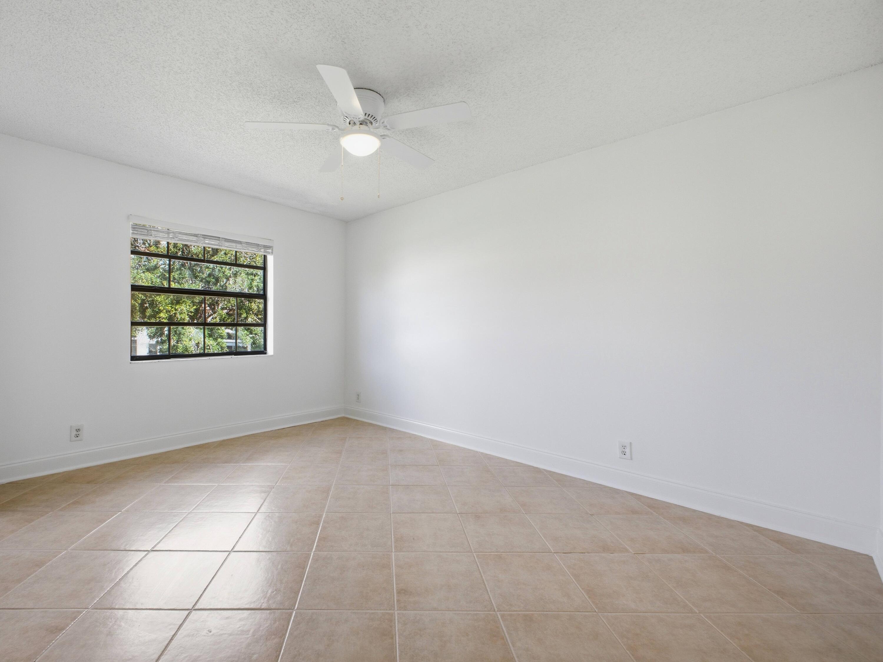 321 Norwood Terrace, Unit N221 Boca Raton, FL 33431 - Photo 23 of 36 Primary Bedroom