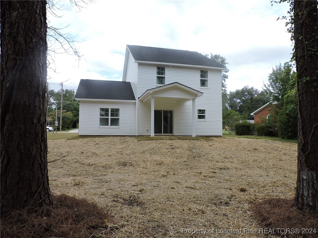 360 Summerhill Road Fayetteville, NC 28303 - Photo 6 of 9 a front view of a house with a yard