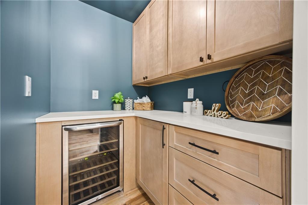 2433 Helmsdale Drive Northeast Atlanta, GA 30345 - Photo 11 of 42 a kitchen with a cabinets and a window