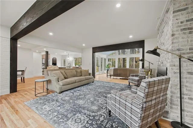a living room with furniture and a table