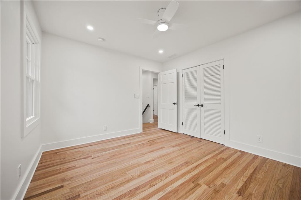 2433 Helmsdale Drive Northeast Atlanta, GA 30345 - Photo 28 of 42 a view of empty room with wooden floor