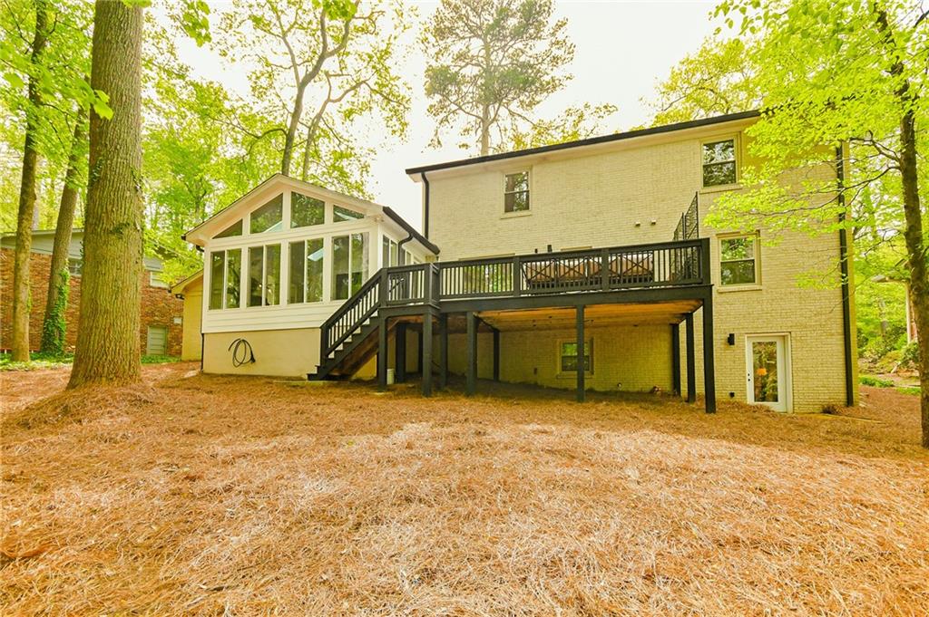 2433 Helmsdale Drive Northeast Atlanta, GA 30345 - Photo 3 of 42 a view of a house with a big yard