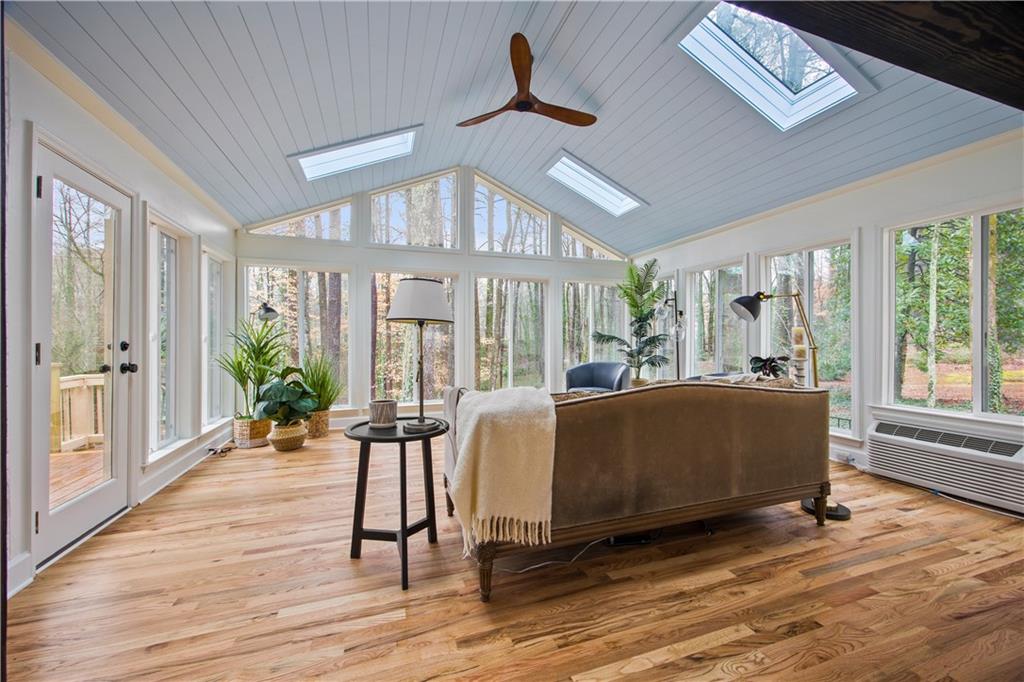 2433 Helmsdale Drive Northeast Atlanta, GA 30345 - Photo 39 of 42 a living room with furniture and a large window