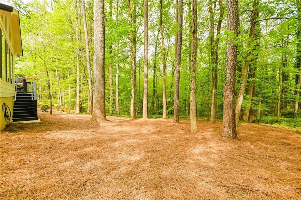 2433 Helmsdale Drive Northeast Atlanta, GA 30345 - Photo 4 of 42 a view of swimming pool with yard