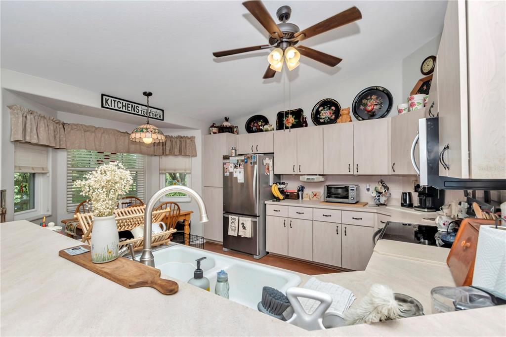 10086 Southwest 62nd Ter Road Ocala, FL 34476 - Photo 12 of 40 a living room with furniture and a large window