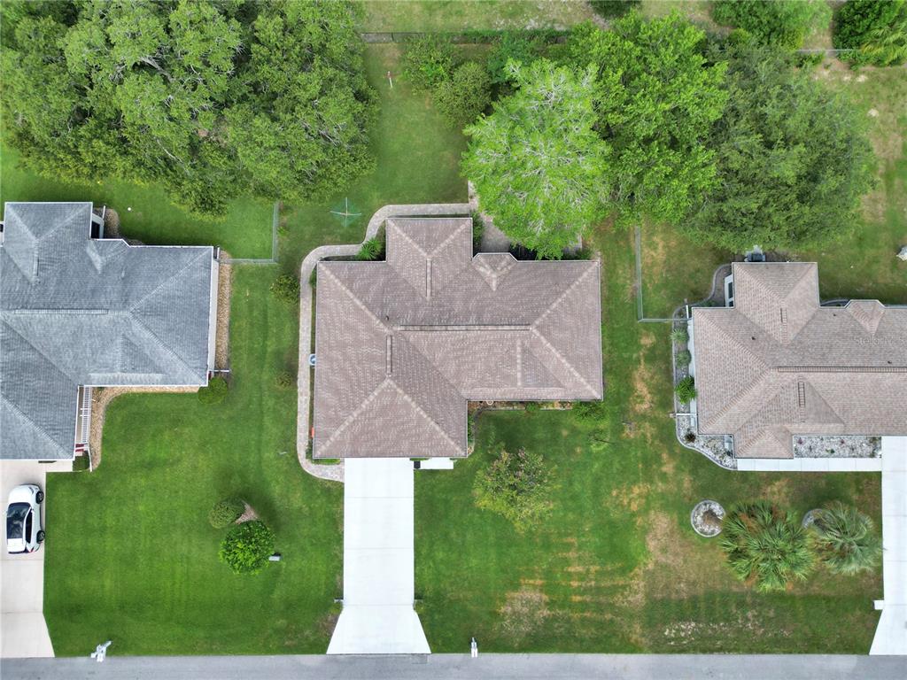 10086 Southwest 62nd Ter Road Ocala, FL 34476 - Photo 33 of 40 an aerial view of a house with garden space and street view