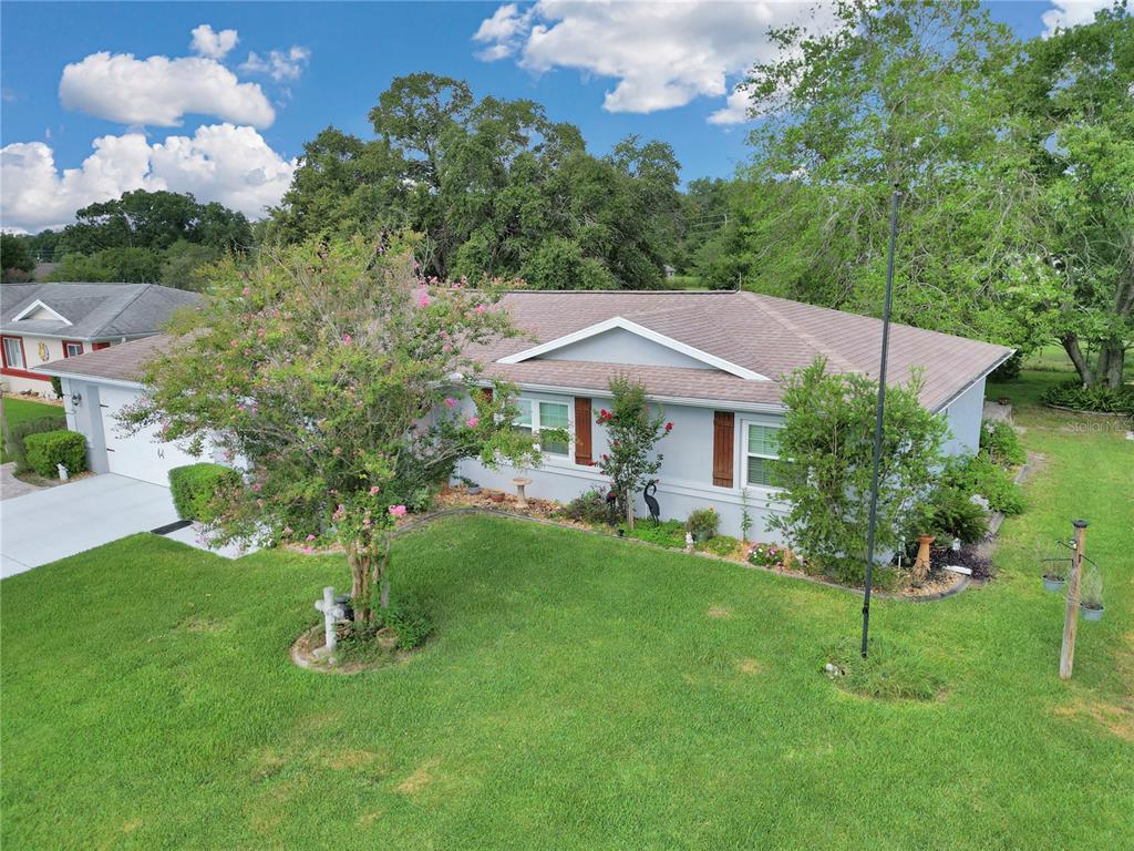 10086 Southwest 62nd Ter Road Ocala, FL 34476 - Photo 40 of 40 a house view with a garden space