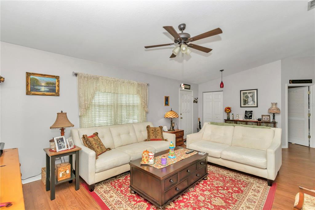 10086 Southwest 62nd Ter Road Ocala, FL 34476 - Photo 7 of 40 a living room with furniture