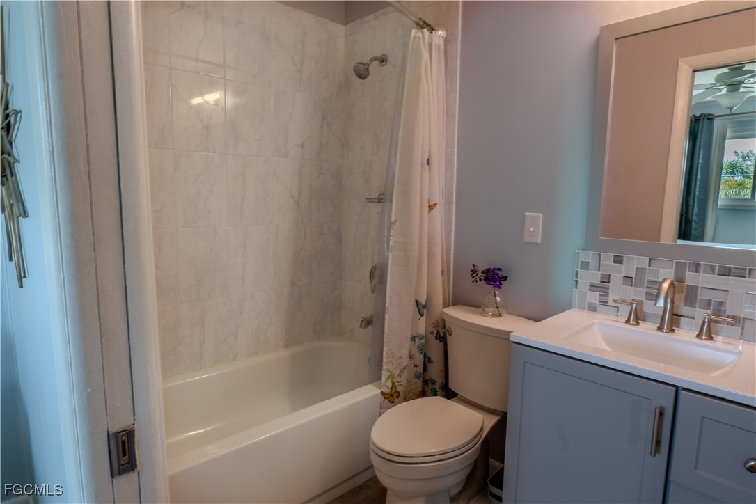 3315 Franzone Road St. James City, FL 33956 - Photo 13 of 37 a bathroom with a sink toilet and shower