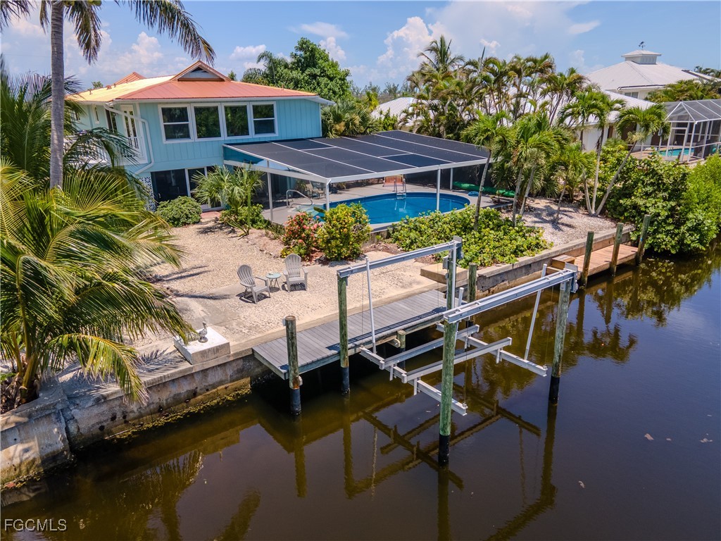 3315 Franzone Road St. James City, FL 33956 - Photo 27 of 37 a view of a swimming pool with a patio