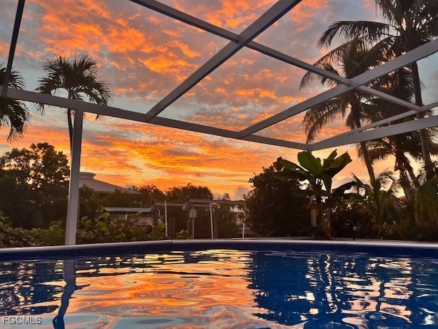 3315 Franzone Road St. James City, FL 33956 - Photo 3 of 37 a view of swimming pool with a yard