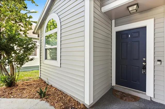 a view of a entryway door front of house
