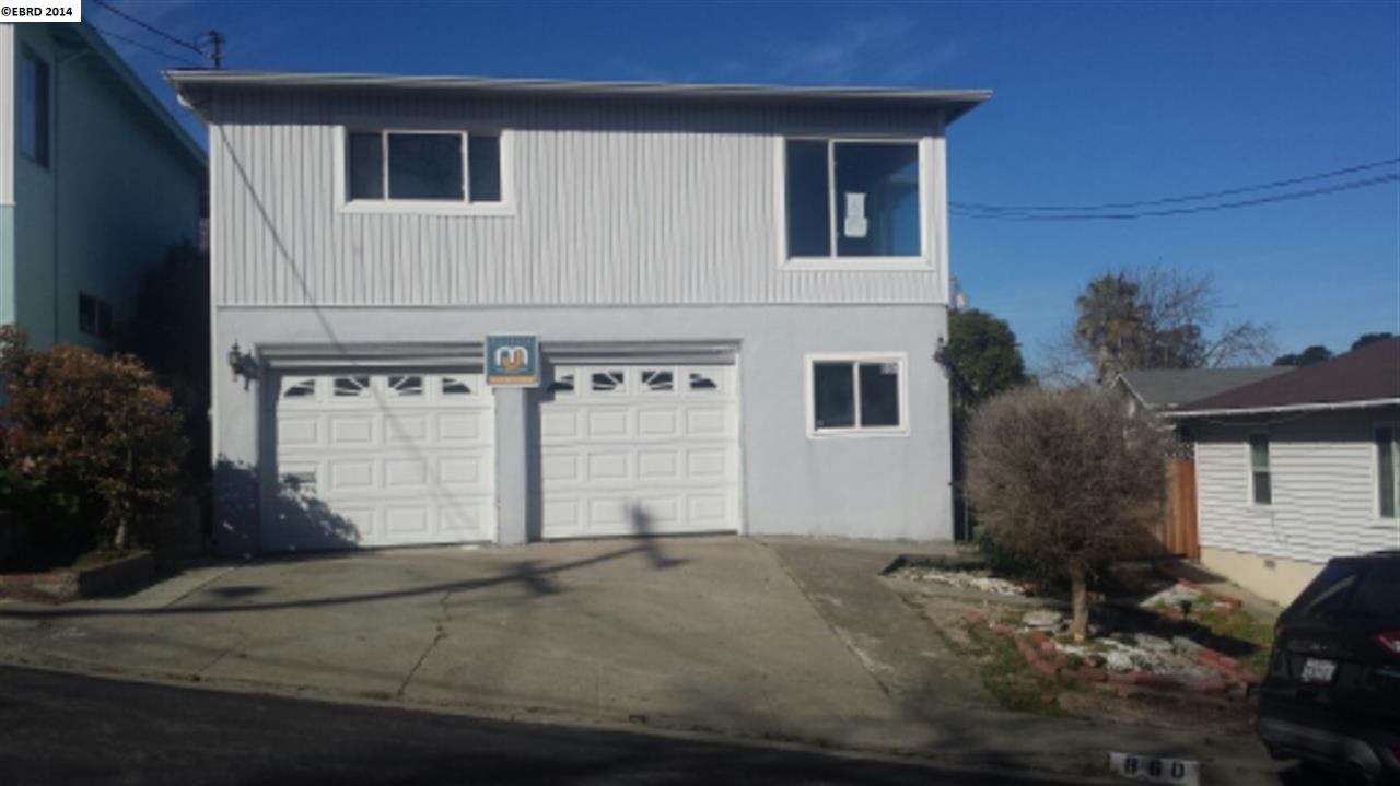 860 Third Avenue Pinole, CA 94564 - Photo 1 of 1 a front view of a house with a yard