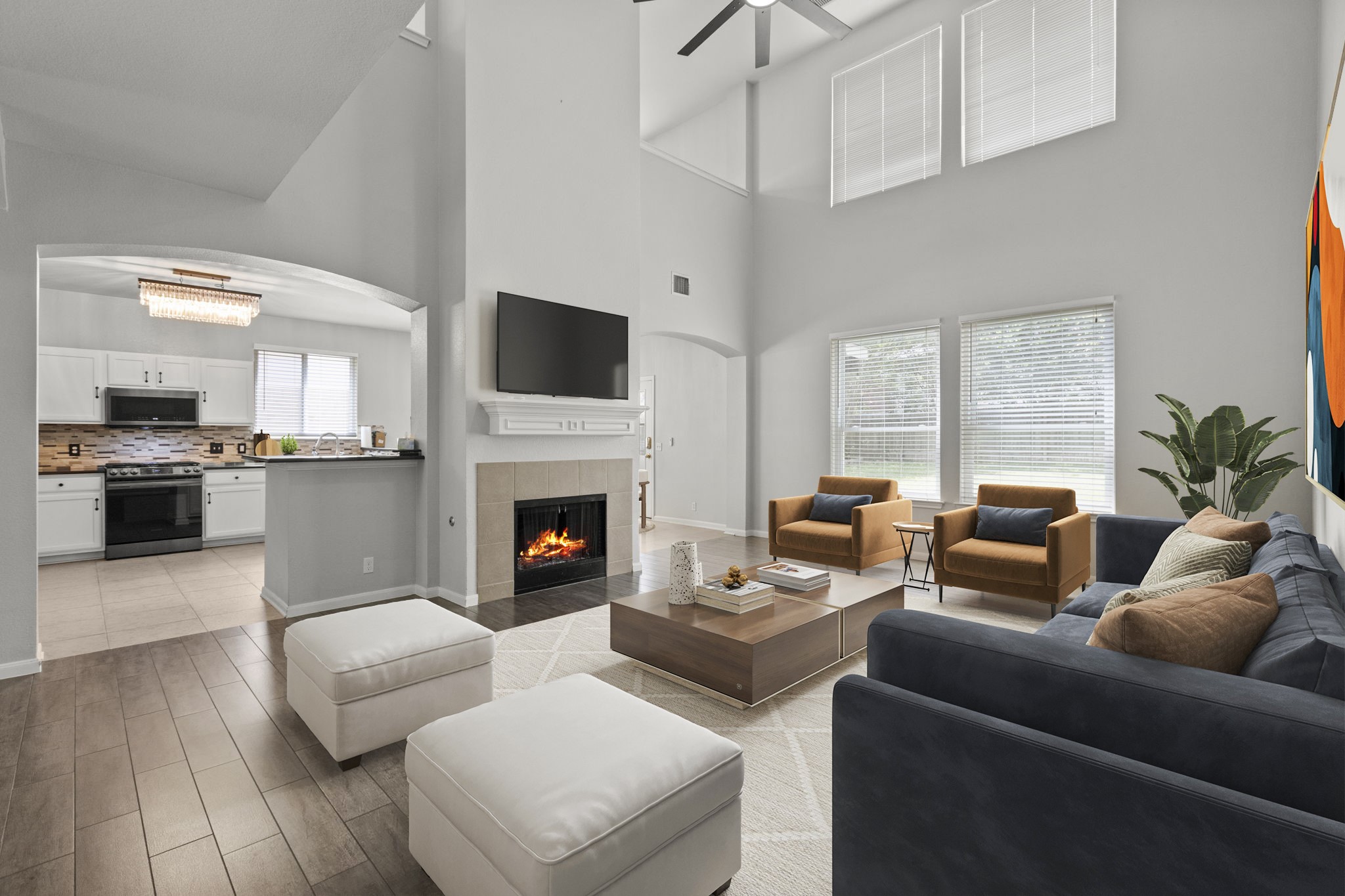 a living room with furniture and a fireplace