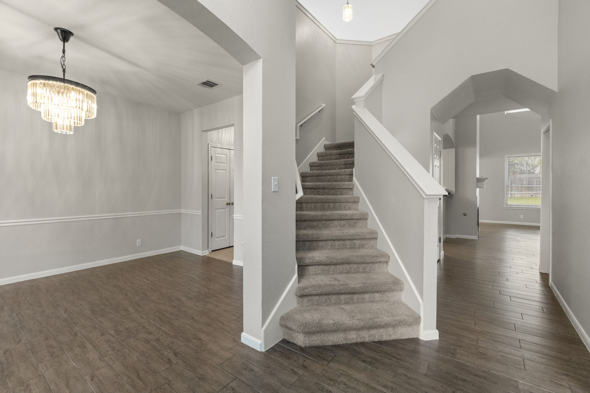 1100 Vanderbilt Circle Pflugerville, TX 78660 - Photo 17 of 39 a view of an entryway with wooden floor