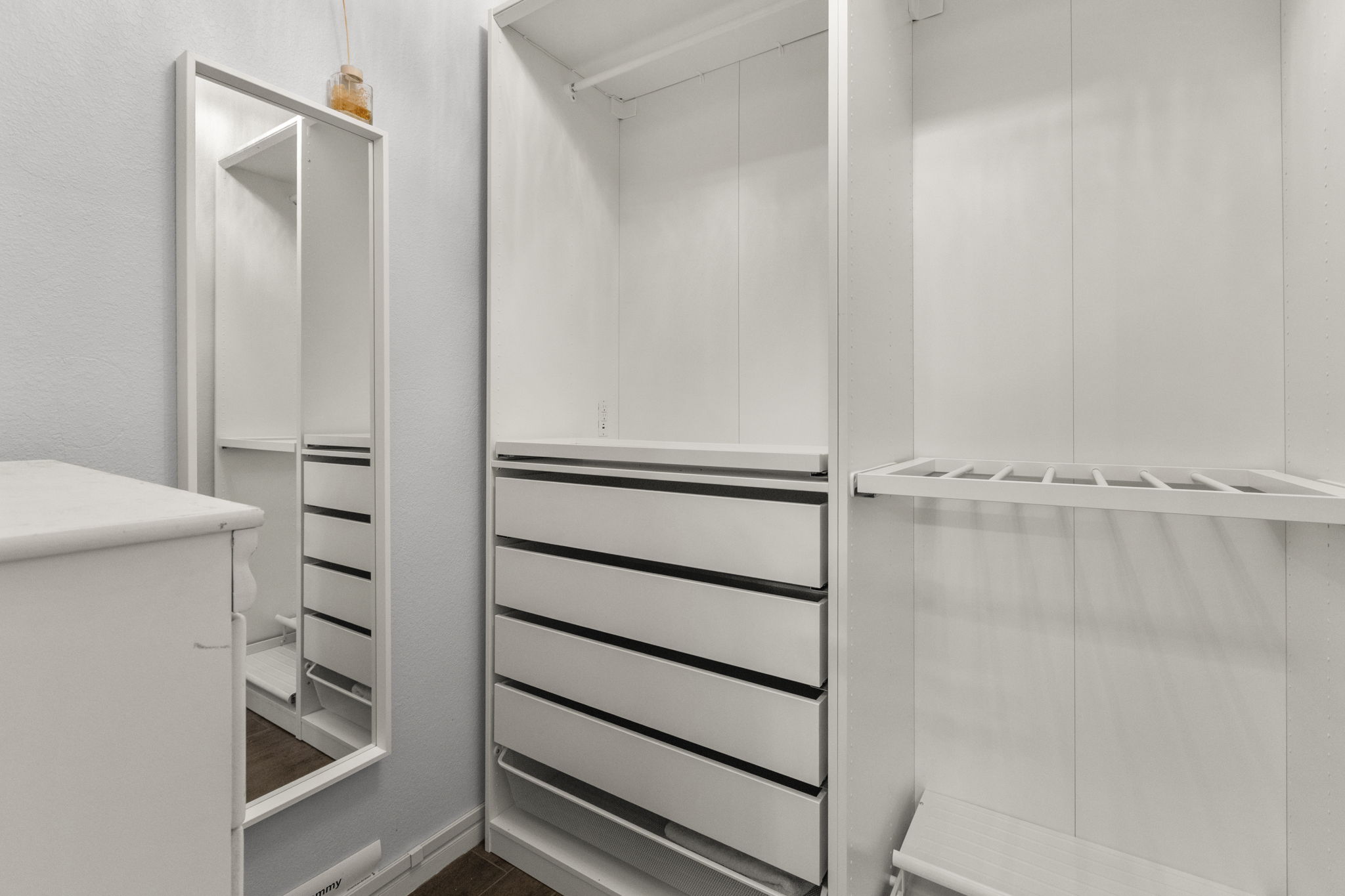 1100 Vanderbilt Circle Pflugerville, TX 78660 - Photo 28 of 39 a view of walk in closet with empty racks