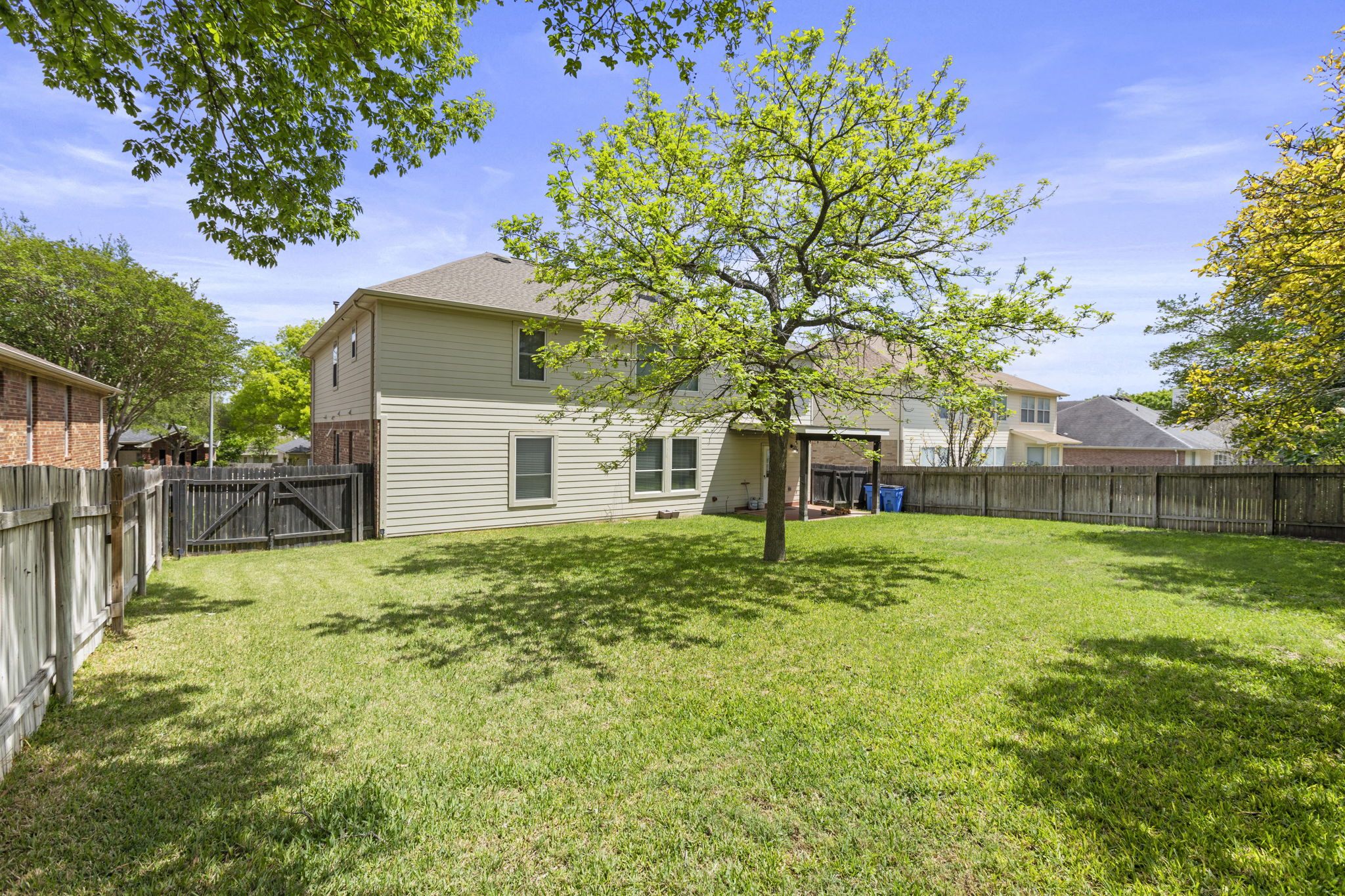 1100 Vanderbilt Circle Pflugerville, TX 78660 - Photo 35 of 39 a yellow house in middle of the forest