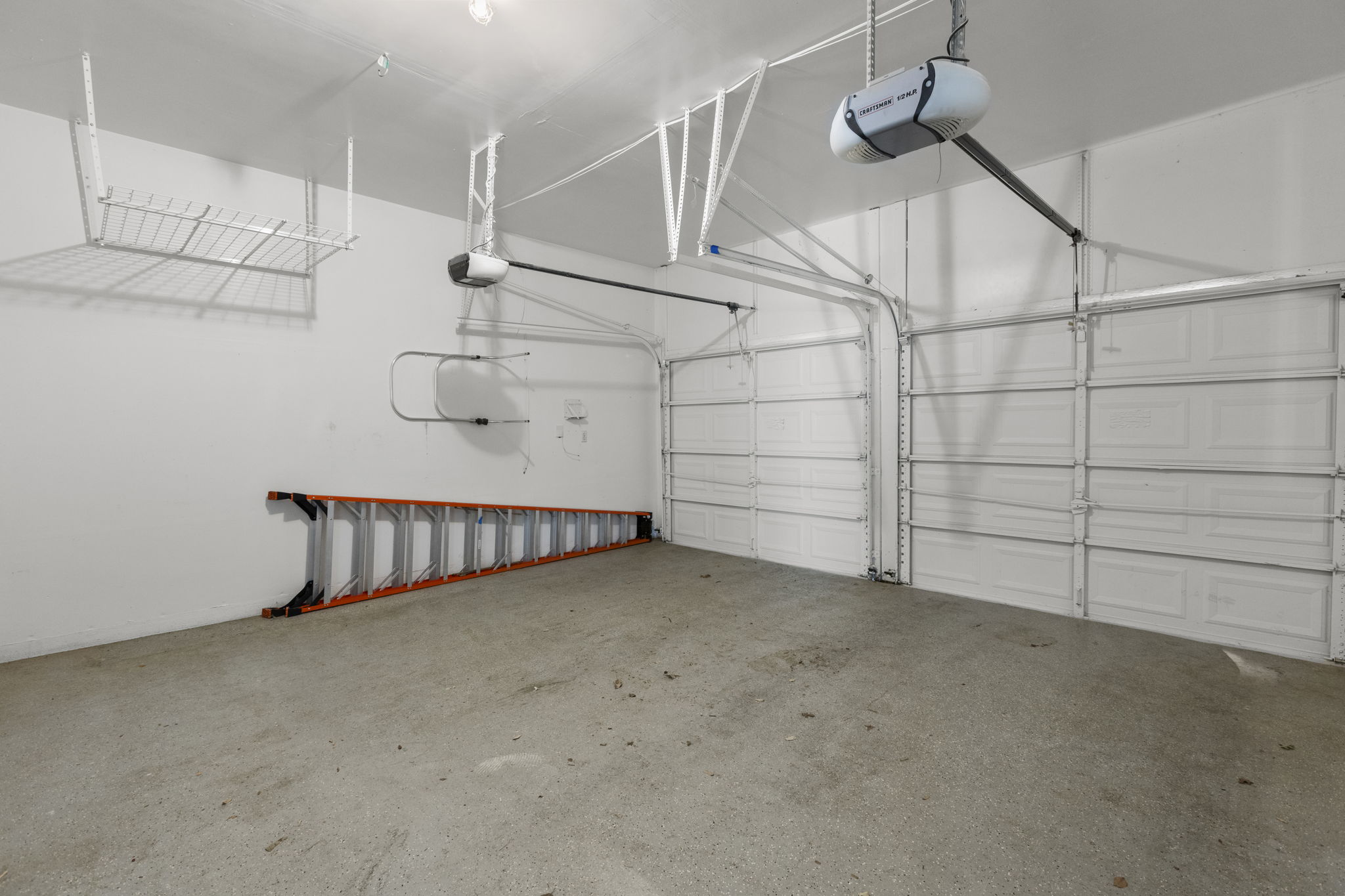 1100 Vanderbilt Circle Pflugerville, TX 78660 - Photo 37 of 39 a view of a room with racks on the wall