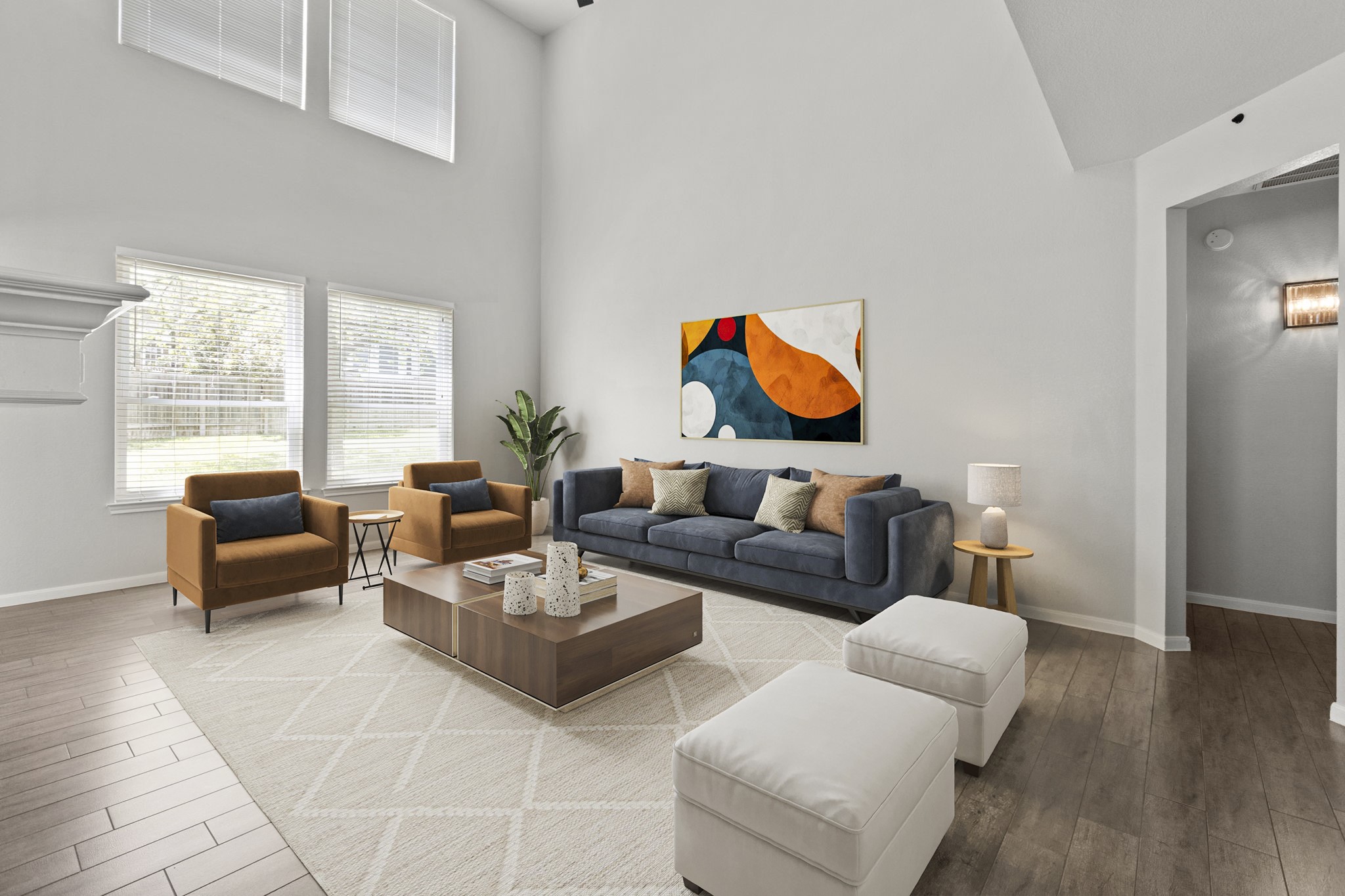 1100 Vanderbilt Circle Pflugerville, TX 78660 - Photo 6 of 39 a living room with furniture a rug and a painting on the wall