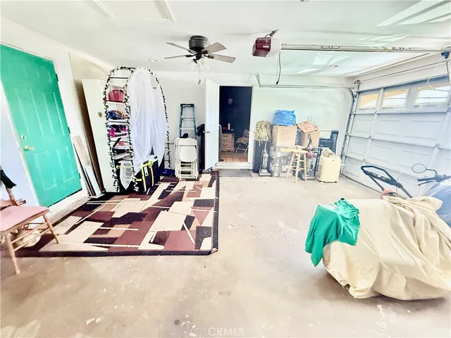 a view of a swimming pool with an outdoor seating