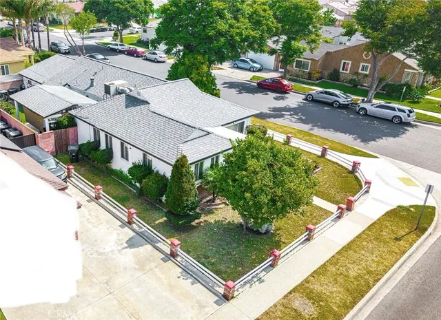 a view of a house with fountain and a fountain