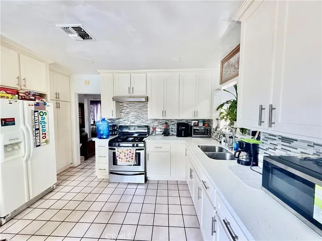 a view of a back yard of the house