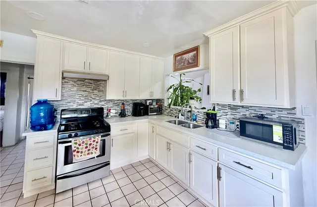 a bedroom with furniture and a bed