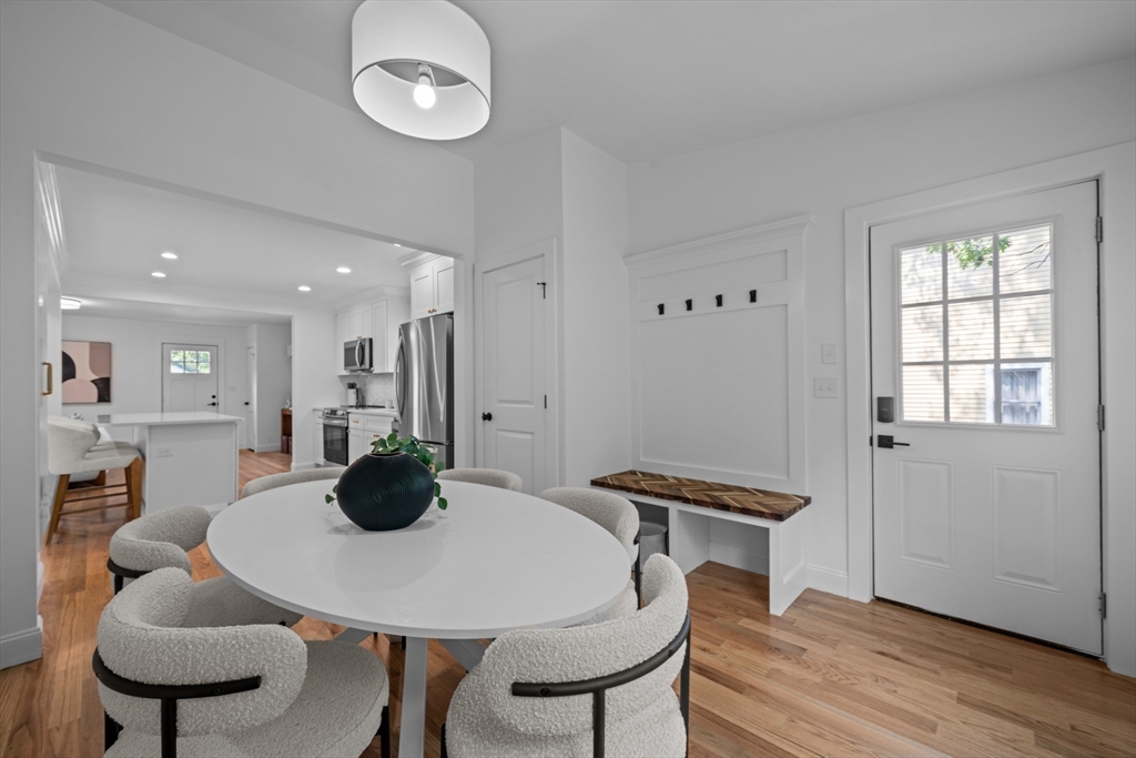 96 Alden Street Dedham, MA 02026 - Photo 13 of 38 a view of a dining room with furniture and wooden floor