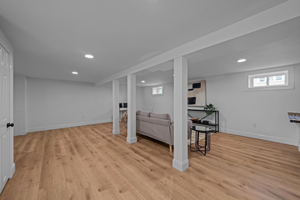 96 Alden Street Dedham, MA 02026 - Photo 16 of 38 a view of livingroom with hardwood floor and workspace