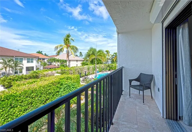 a view of a two chair in the balcony