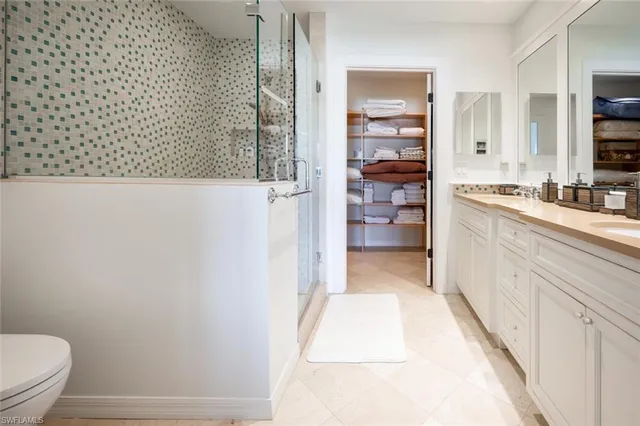 a bathroom with a bathtub and a toilet