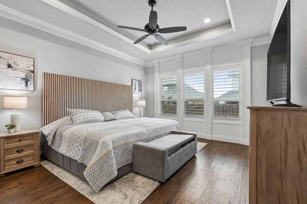 104 Ryder Court Hurst, TX 76053 - Photo 16 of 35 Private Primary Retreat With Tray Ceilings And Hardwood Flooring