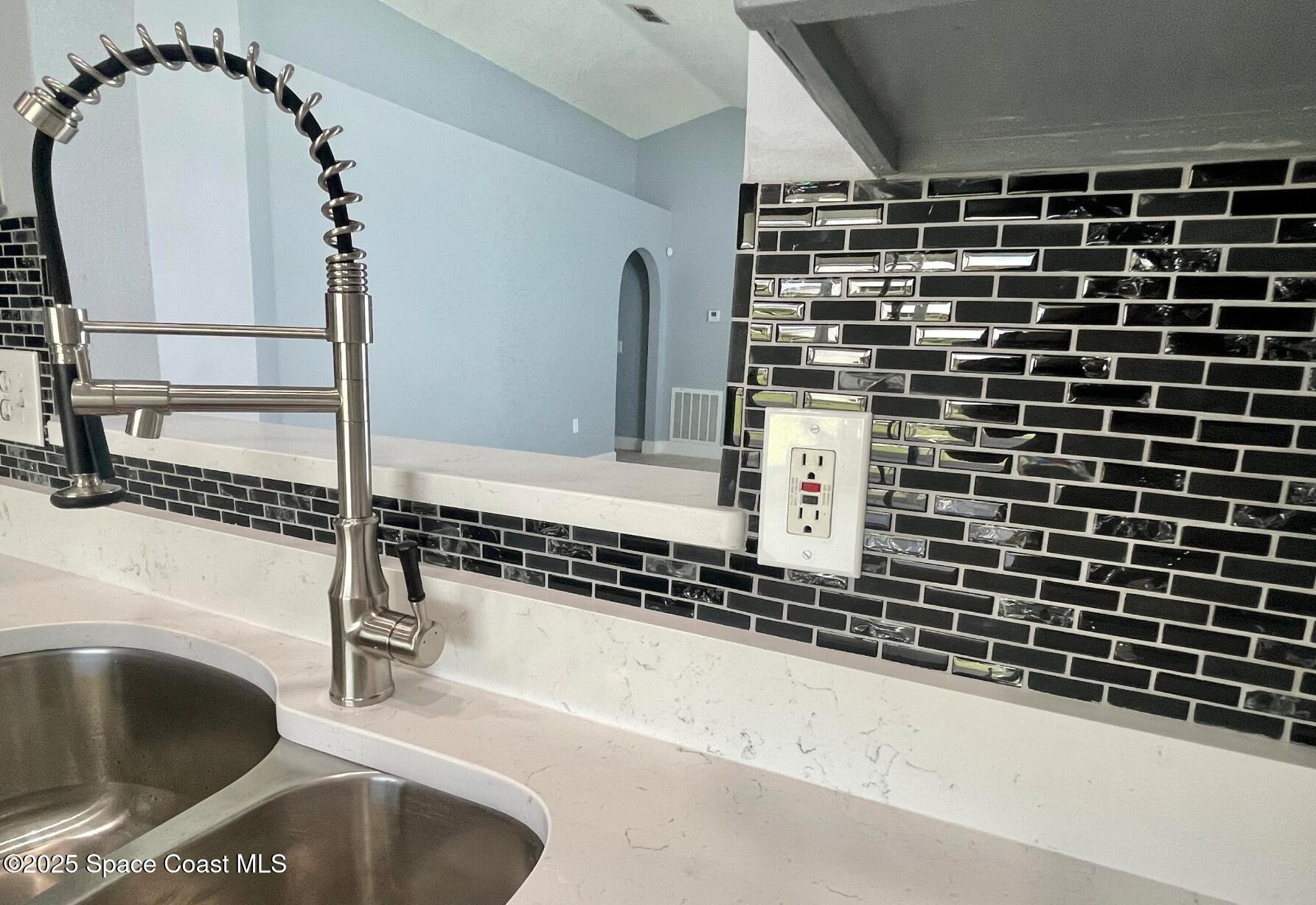 2226 Redwood Circle Palm Bay, FL 32905 - Photo 11 of 27 a bathroom with a bathtub and a sink