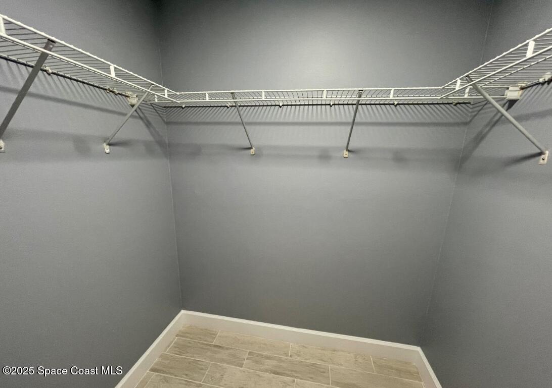 2226 Redwood Circle Palm Bay, FL 32905 - Photo 21 of 27 a view of a room with racks on the wall