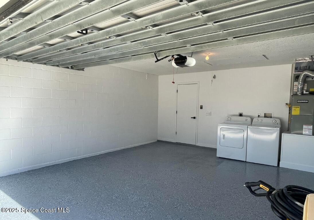 2226 Redwood Circle Palm Bay, FL 32905 - Photo 23 of 27 a view of storage and utility room with washer and dryer
