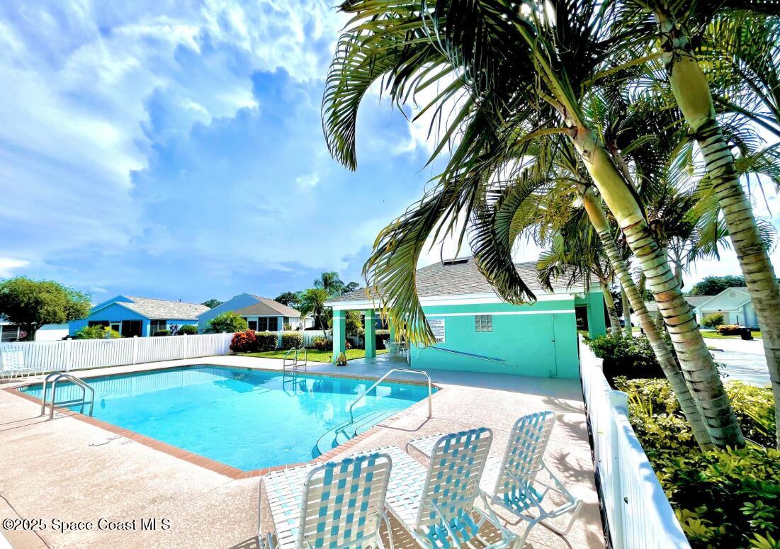 2226 Redwood Circle Palm Bay, FL 32905 - Photo 26 of 27 a view of a swimming pool with a yard