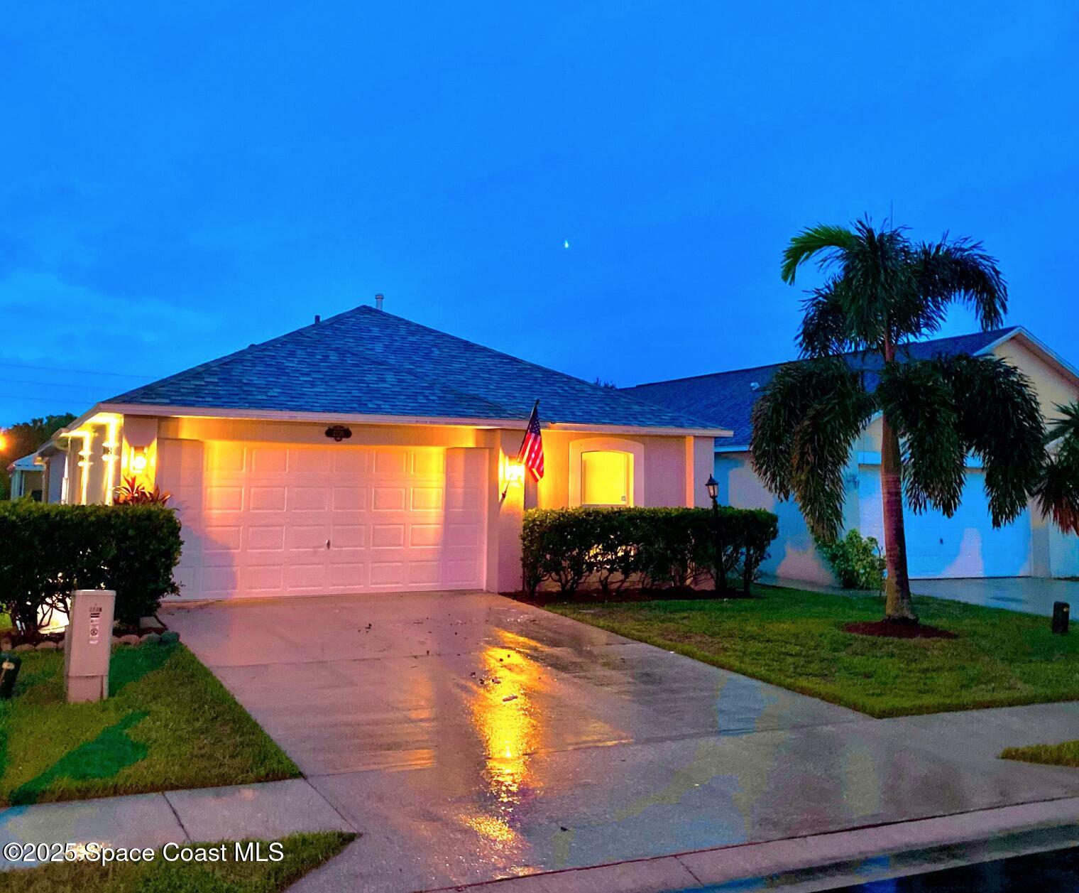 2226 Redwood Circle Palm Bay, FL 32905 - Photo 3 of 27 a view of a yard with a house