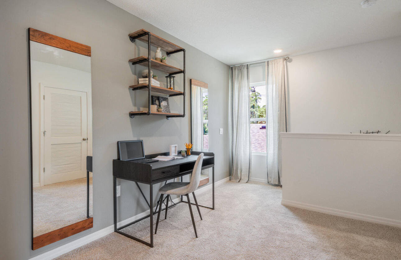 12276 Nettuno Way Port St. Lucie, FL 34987 - Photo 12 of 21 a view of a workspace with furniture